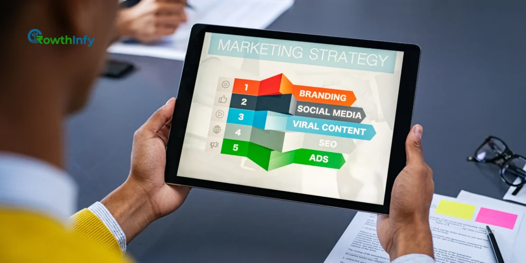 A laptop displaying digital marketing charts and graphs