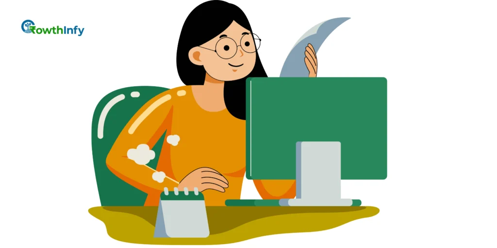 Freelancer working on a laptop in a modern workspace, managing income tax records.