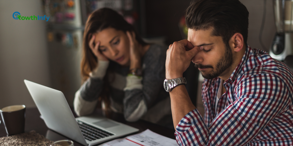Person analyzing debt details on a laptop to plan repayment