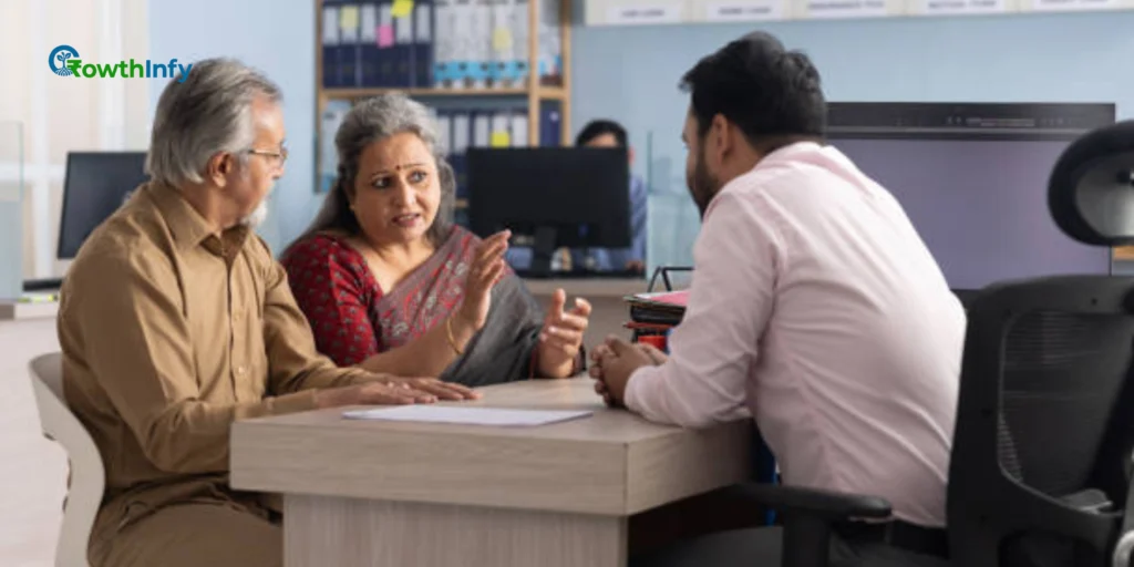 Indian couple consulting a financial advisor for debt management