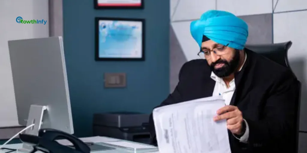 Businessperson analyzing GST documents for reverse charge mechanism